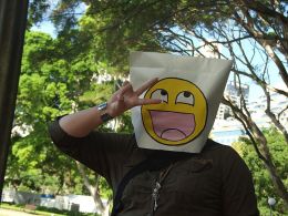 Paper_bag_mask_with_4chan_smiley_at_Anon_raid
